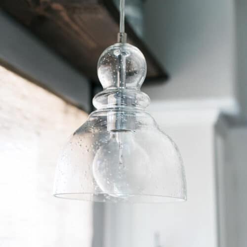 Beautiful Seeded Glass Pendant Light hanging in the kitchen.