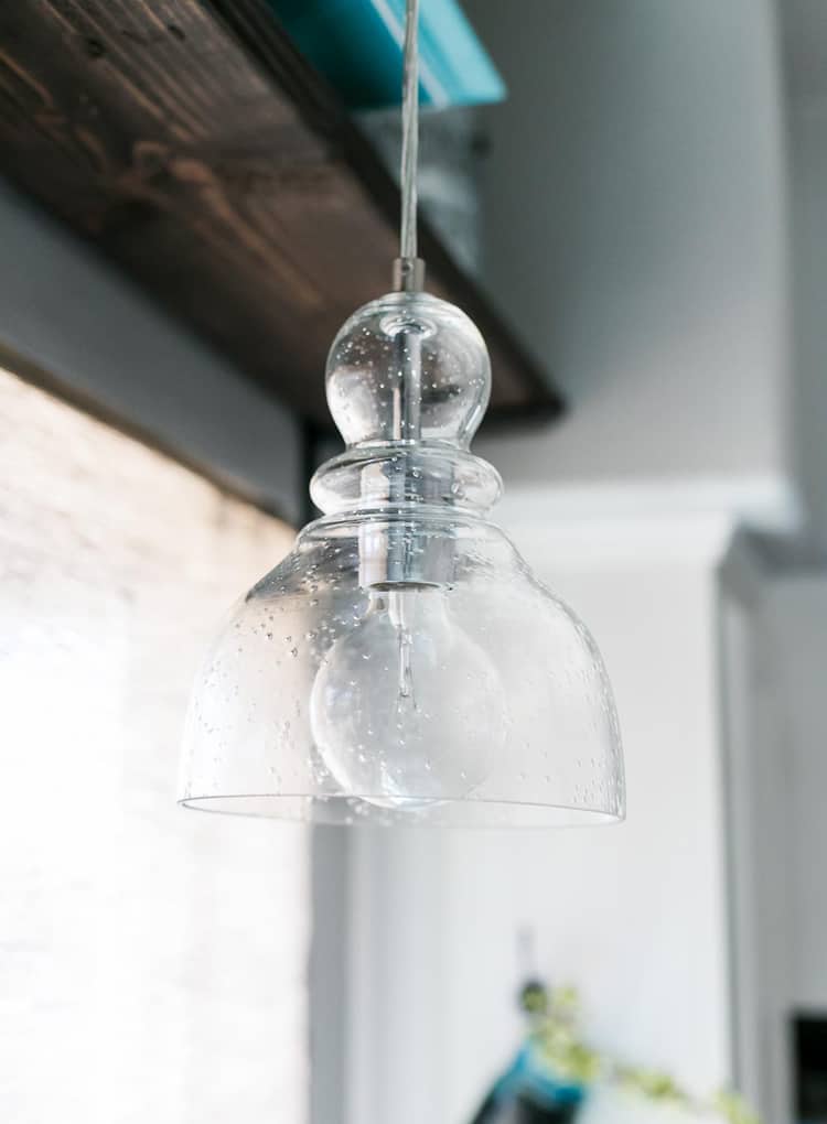 Beautiful Seeded Glass Pendant Light hanging in the kitchen.