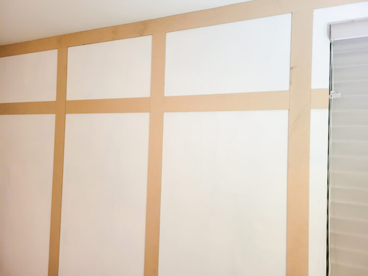 bender board used as board and batten attached to bedroom feature wall.